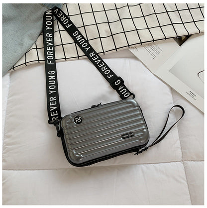 Mini suitcase in the shape of a shoulder bag