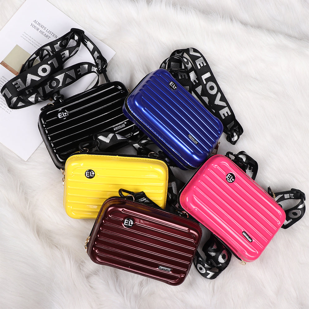 Mini suitcase in the shape of a shoulder bag
